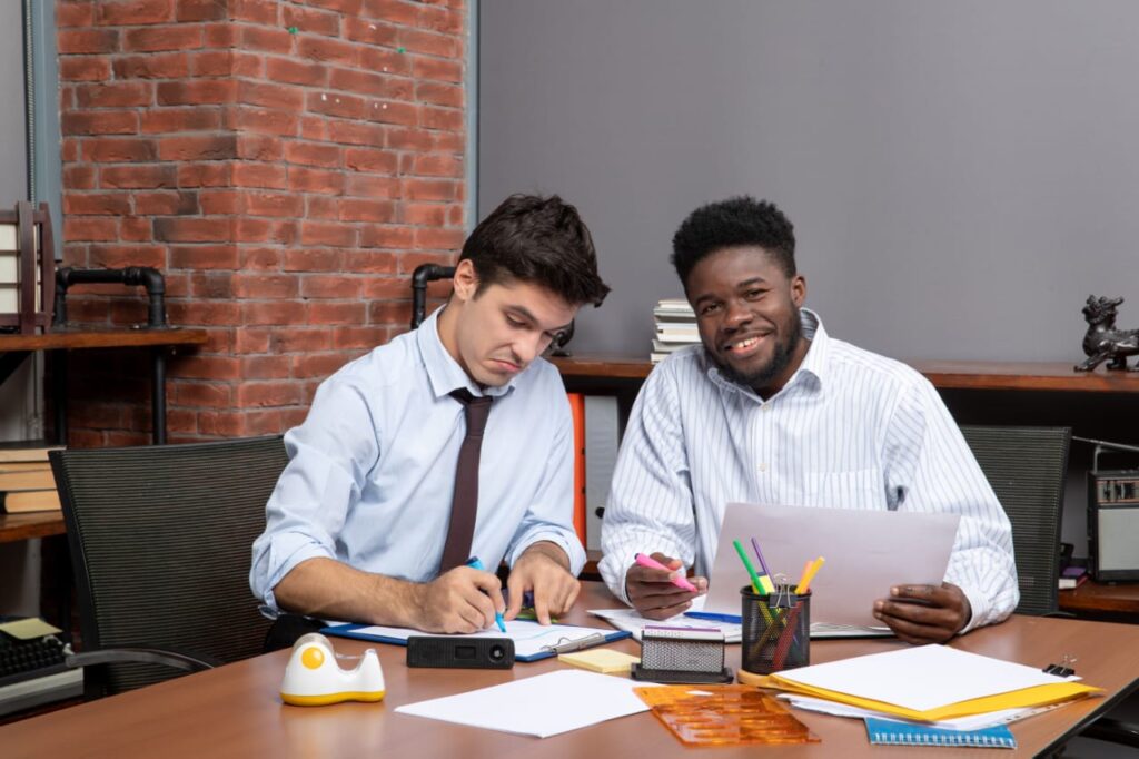 Students working on scholarship applications for health programs, preparing for top scholarships for health students in 2026.